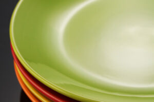 set of dishware on black background