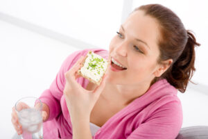 Fitness woman relax glass water snack sportive