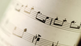 Closeup of old sheet music with selective focus and very shallow DOF