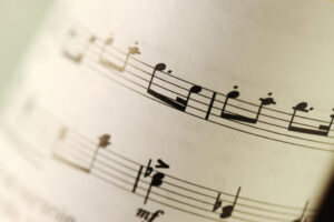 Closeup of old sheet music with selective focus and very shallow DOF
