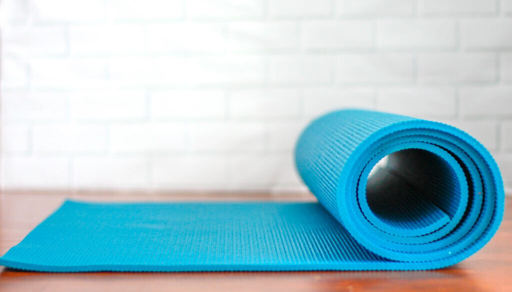 Roll-Up Yoga Mat on a White Background