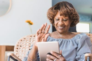 Older African American Woman video chatting_inline